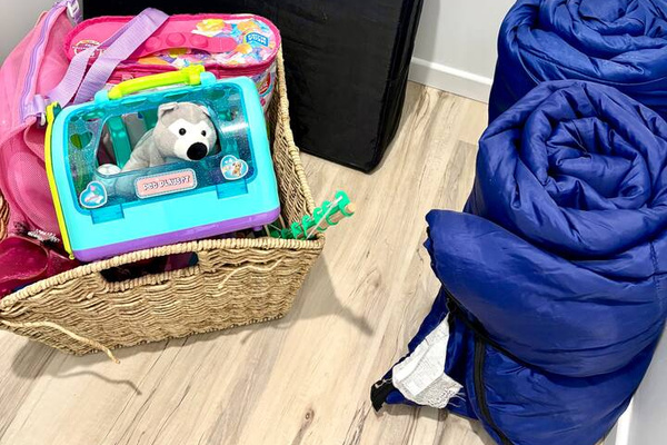 Portable crib and kids toys. We also have games and some puzzles to keep those kiddos busy! 