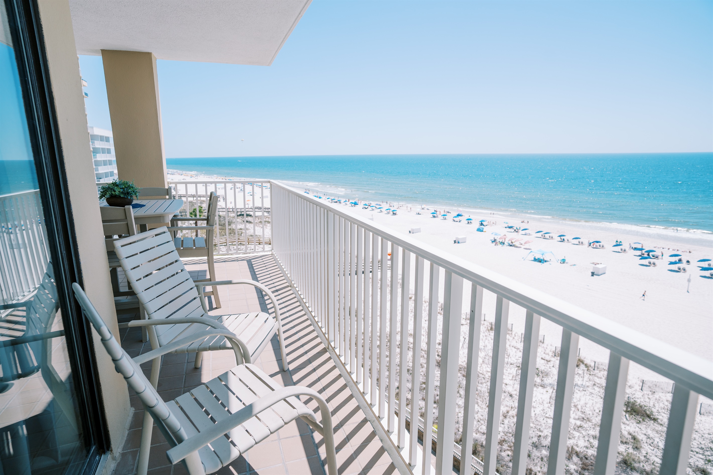 Additional balcony seating with awesome views of the beach and water! Outside closet has all your beach supplies in it, too!