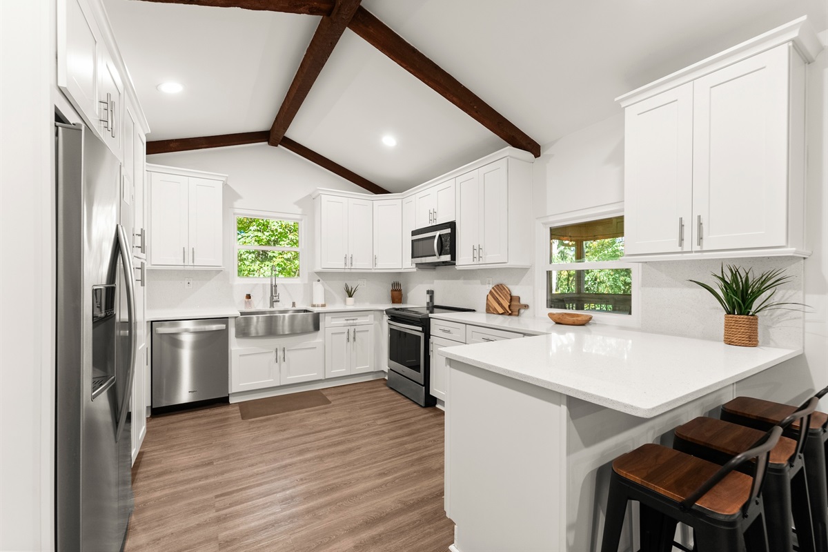 Enjoy cooking gourmet meals in the kitchen - well-stocked with everything you need. Granite countertops and stainless steel appliances.