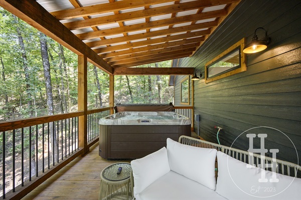 Outdoor living space with hot tub