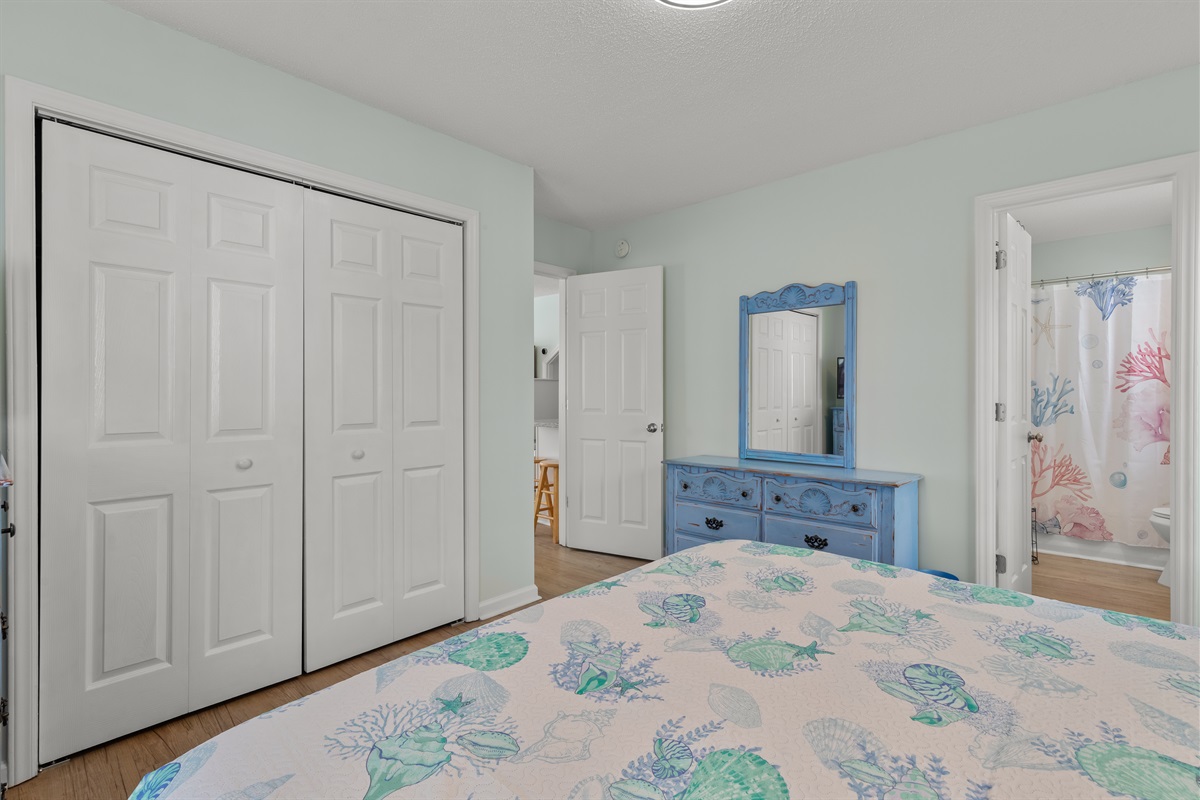 Primary Bedroom with King bed, ensuite bathroom and Smart TV