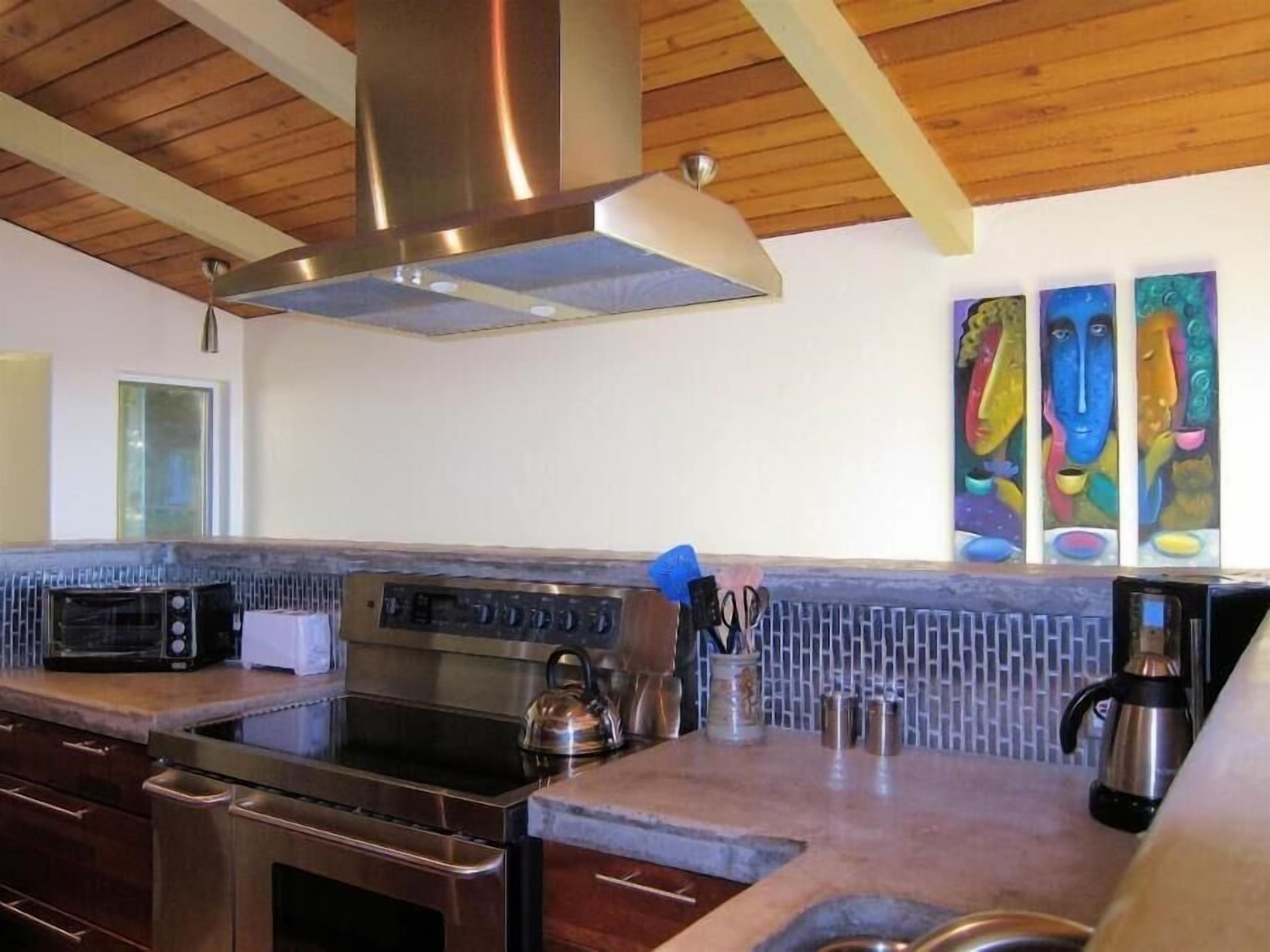 cement counter tops & stainless back splash