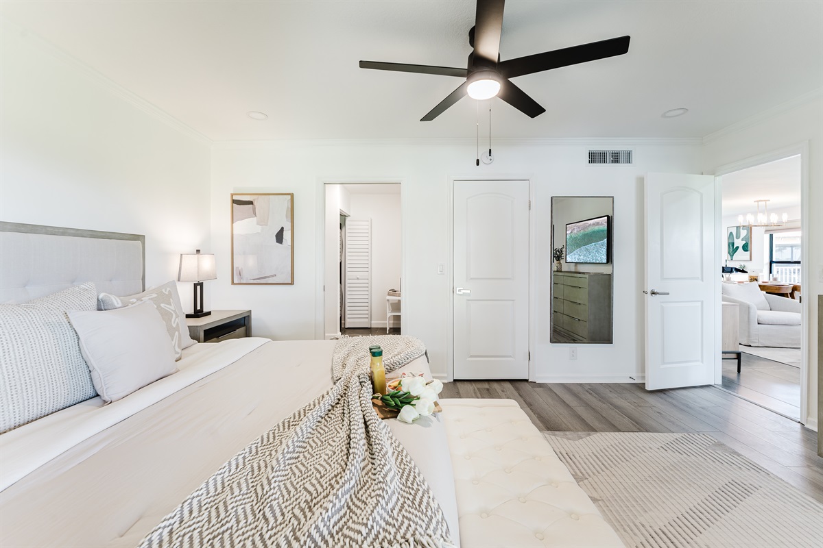 Spacious primary suite with a comfortable king bed and a serene atmosphere. Relaxing retreat designed for restful nights and peaceful mornings. Thoughtfully designed bedroom with hotel-quality comfort