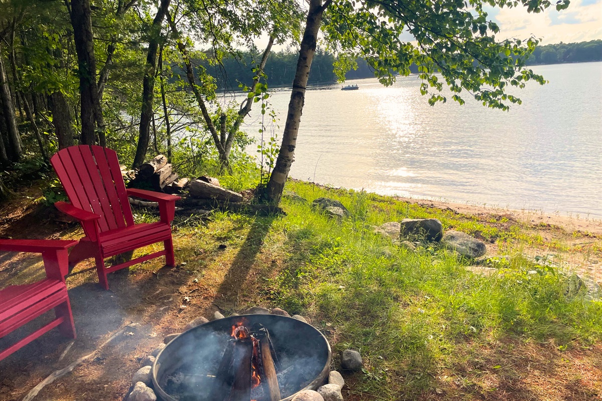 The lakeside fire pit is great place to relax - day or night