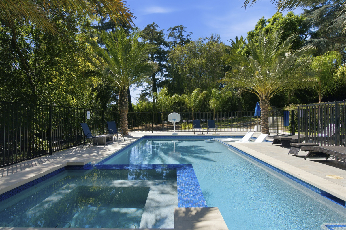 Enjoy a stunning outdoor space with a refreshing pool