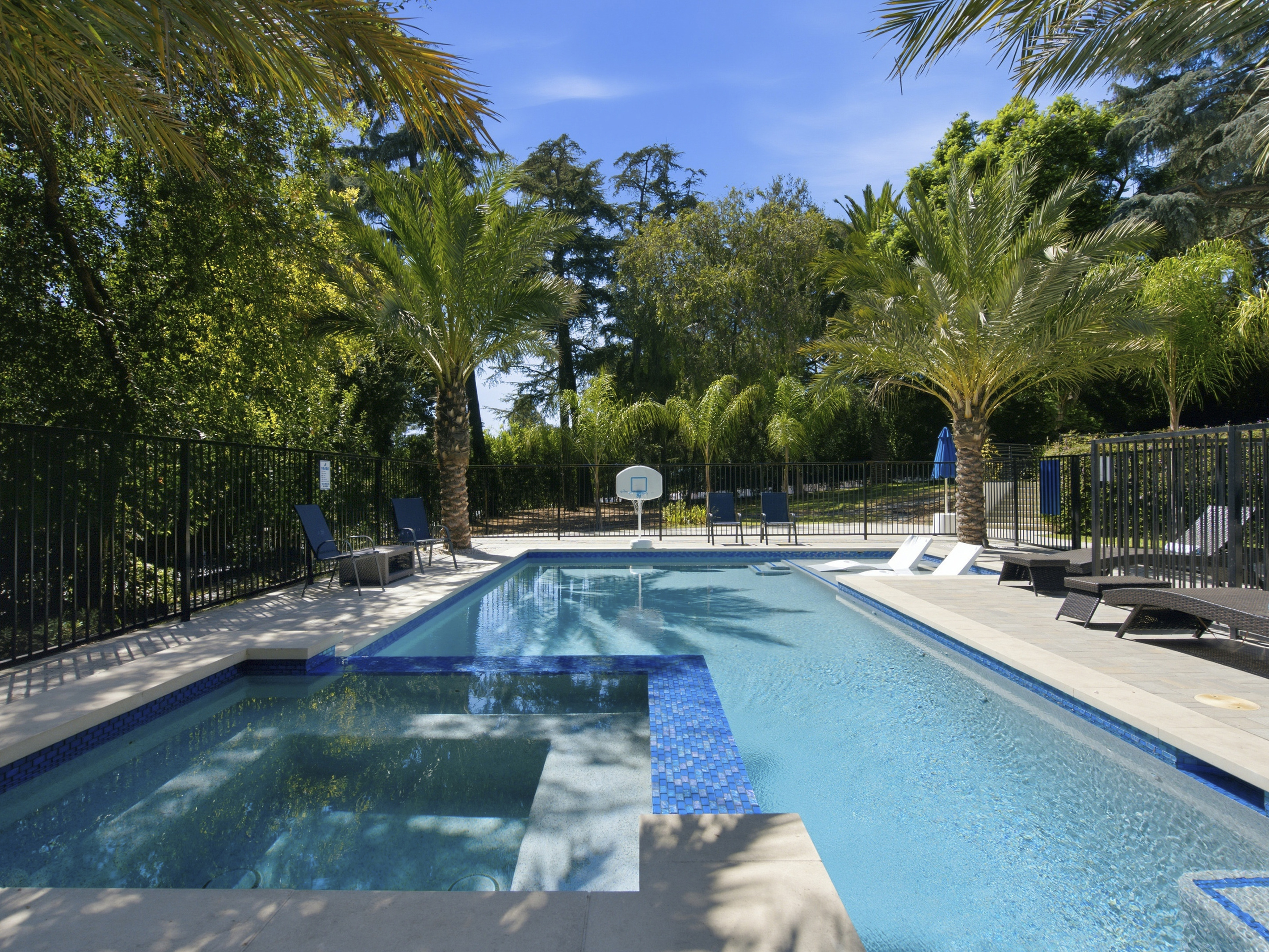 Enjoy a stunning outdoor space with a refreshing pool