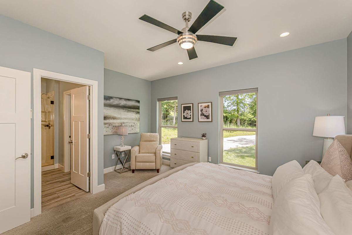 King bedroom with attached bathroom and walk-in closet.