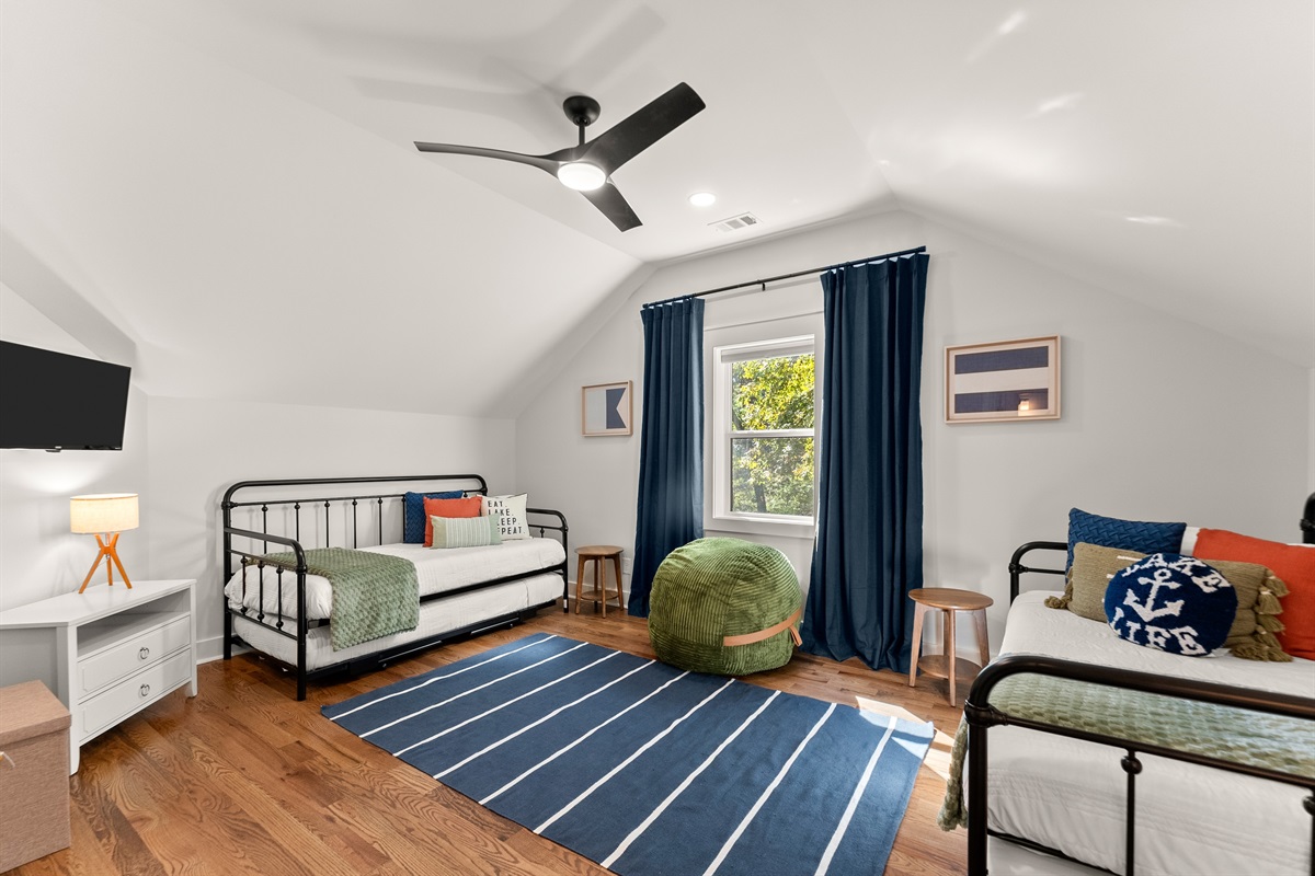 Spacious twin bedroom — fun, bright, and perfect for kids or extra guests.