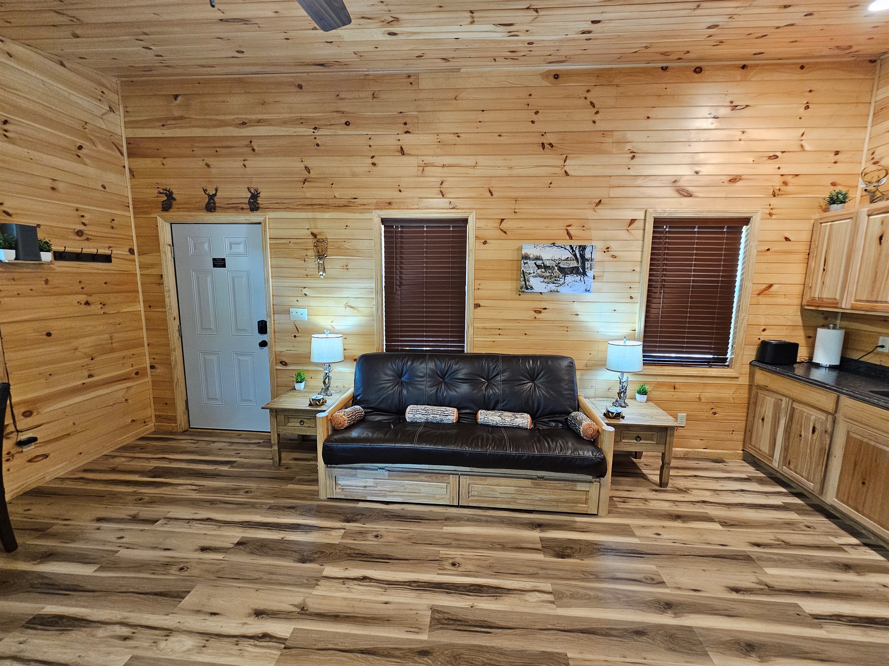 Stretch out on the rustic futon after a day of adventures — the perfect spot for reading, chatting, or an afternoon nap
