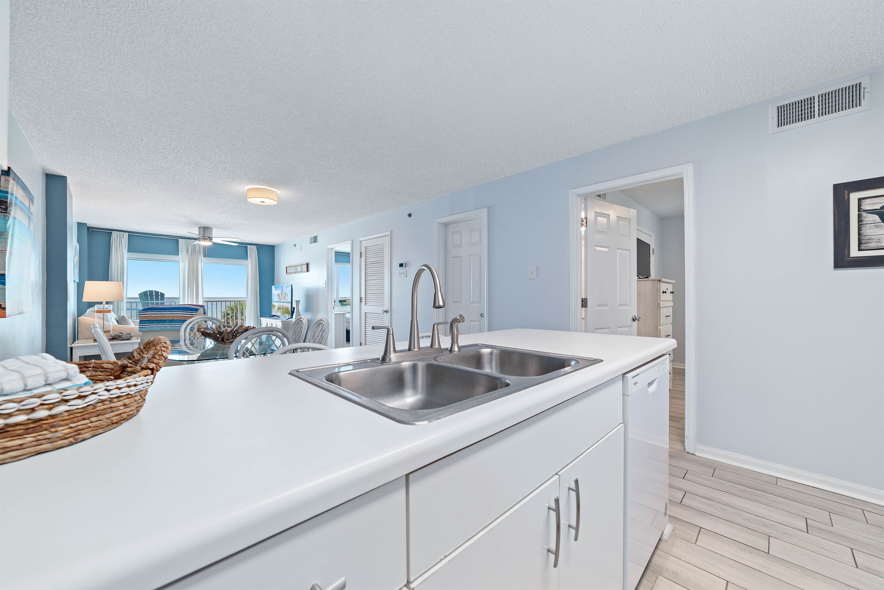 A well-equipped kitchen featuring modern appliances and stylish finishes, perfect for culinary enthusiasts.