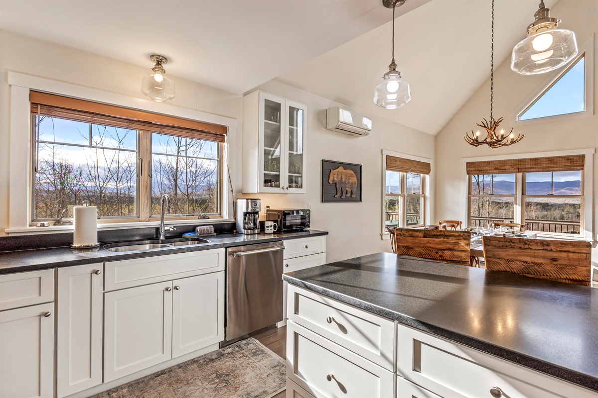 Fully equipped kitchen with a stylish island, perfect for cooking and gathering.