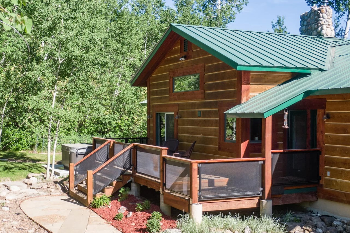 Large, private hot tub adjacent to front deck with easy access from the main floor.