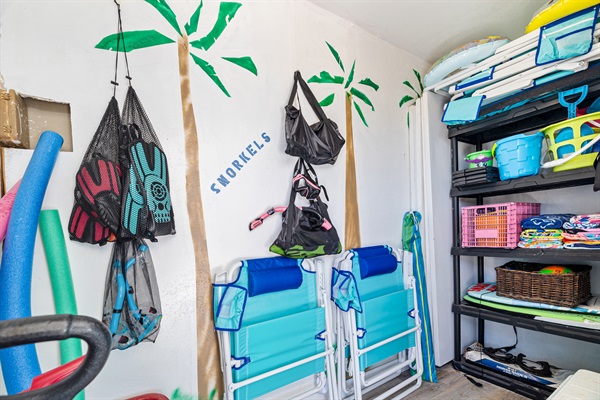 Beach room full of Towels, 10 oversized Beachchairs, Snorkeling gear, Beach Toys, wagon, backyard games, umbrella, mat, and a Cooler!