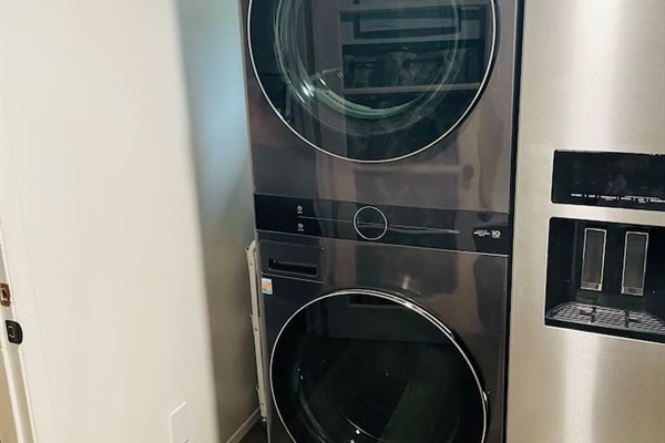 A stacked washer and dryer with a turbo cycle make laundry quick and convenient during your stay.