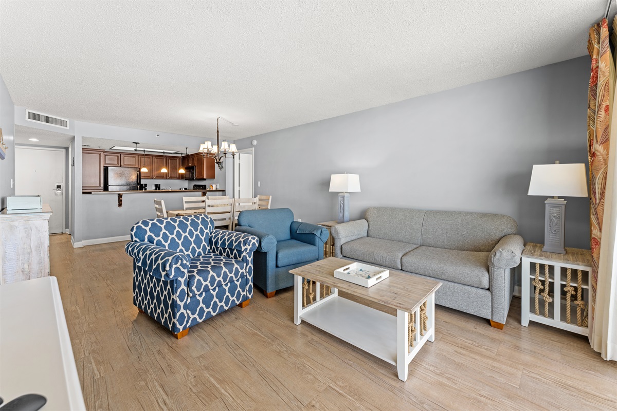 Spacious Living Room with sleeper sofa and  balcony access