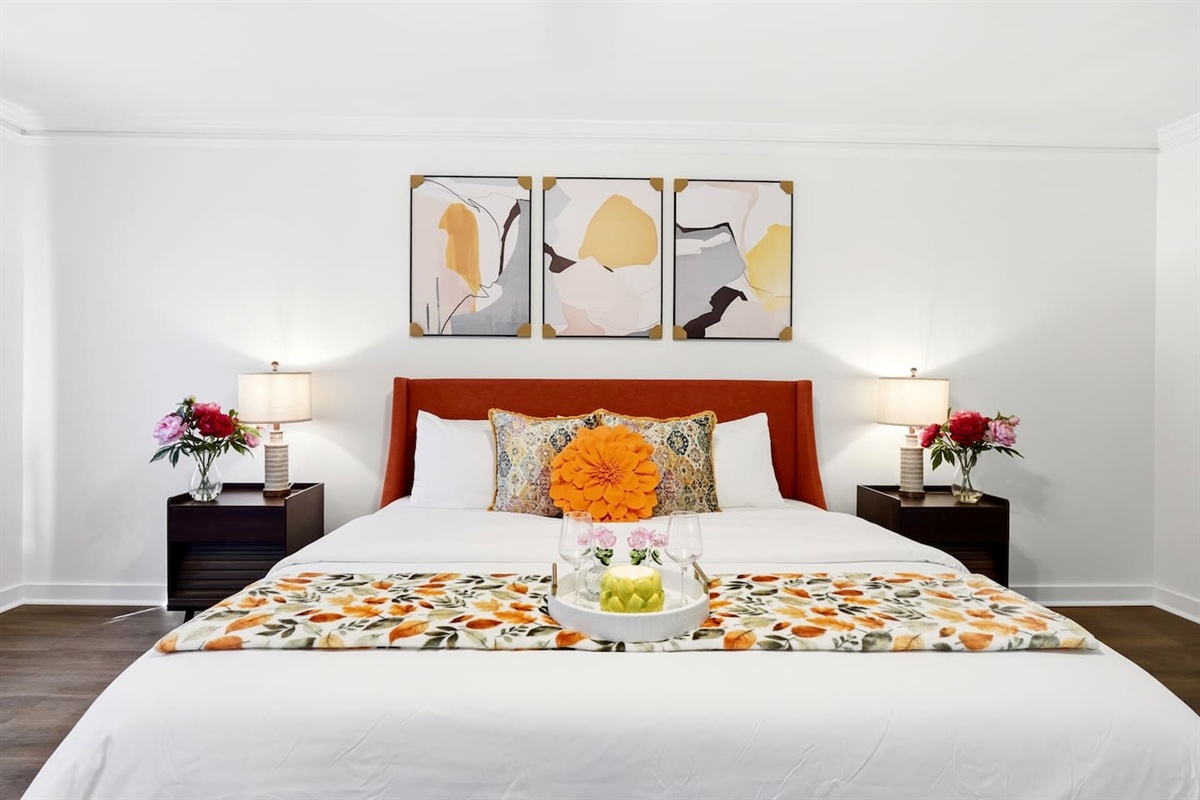 Beautiful second-level master bedroom featuring a king bed, a Roku-powered Smart TV, located all the way to the right at the top of the staircase. This room includes 2 full-body towels, 2 washcloths, and 2 hand towels for your stay.