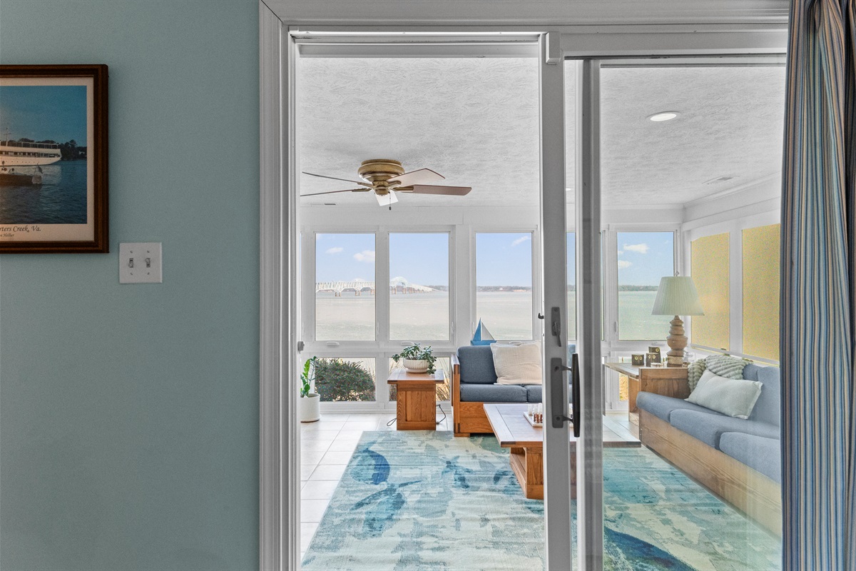 Sunroom Retreat: Panoramic views and natural light create the perfect escape for relaxation!