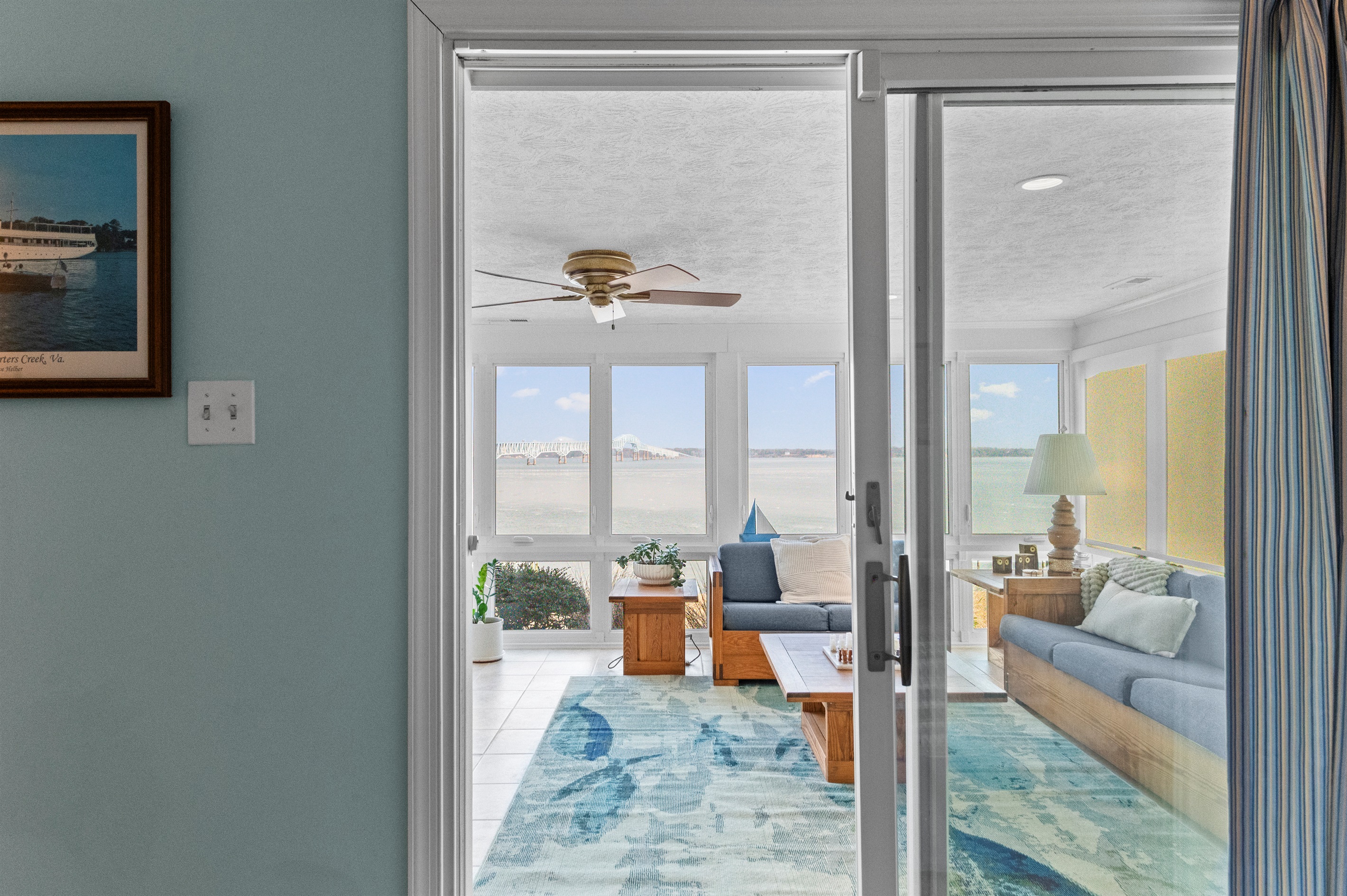 Sunroom Retreat: Panoramic views and natural light create the perfect escape for relaxation!