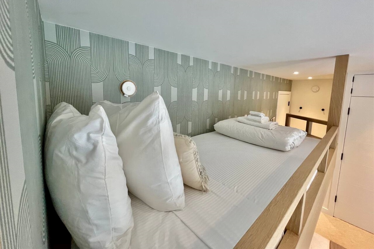 Bedroom #3 features solid oak built-in overhead Twin XL bed with privacy reading light and USB/AC power outlet