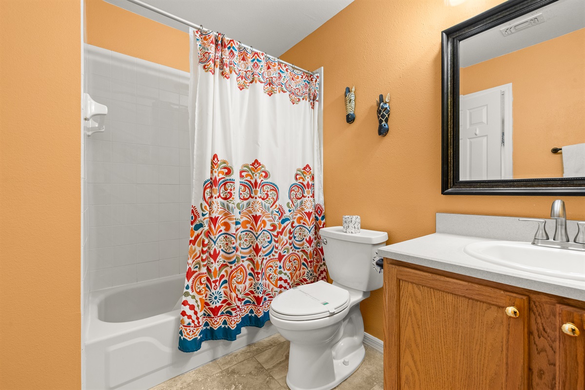 With combo tub and shower.