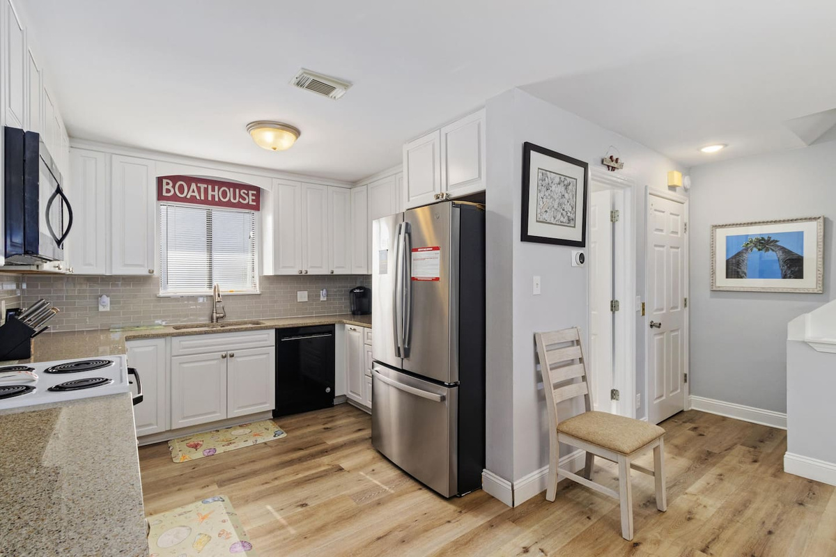 Everything you packed for or forgot, this kitchen has it &mdash; roomy, well- stocked, and ready for your longest beach day.