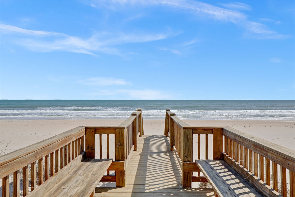 Take a seat on the private boardwalk and watch the waves roll in.