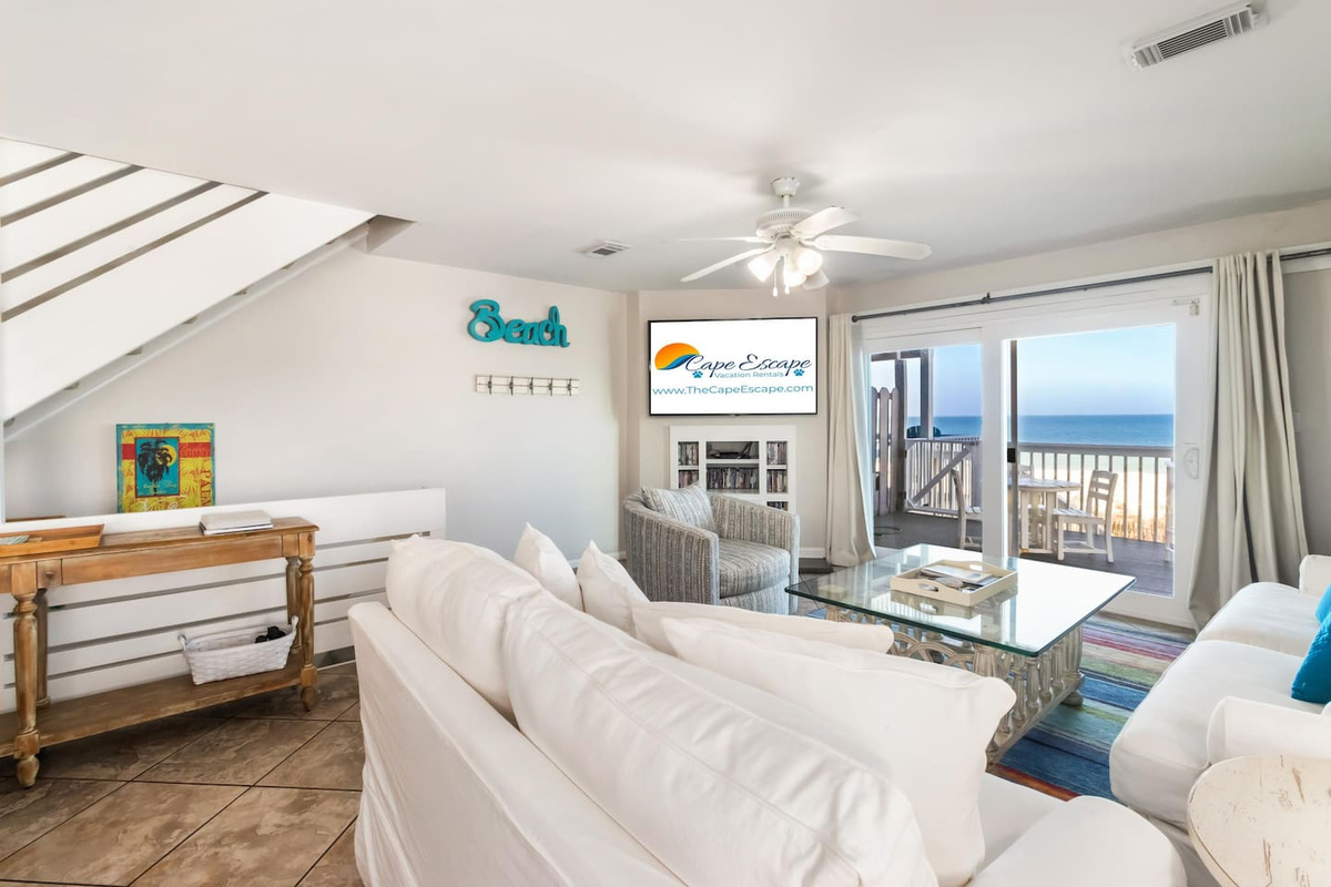 Gather the whole group in the main living space and let the Gulf do the talking &mdash; every seat faces the water.