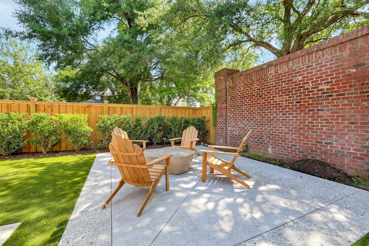 Outdoor patio space along the side of the home. Easily accessed through kitchen.