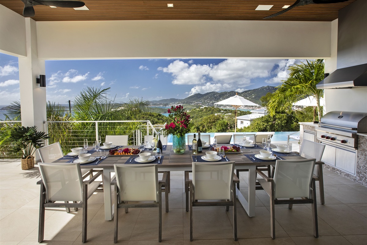 8 person outdoor dining table just off the kitchen.