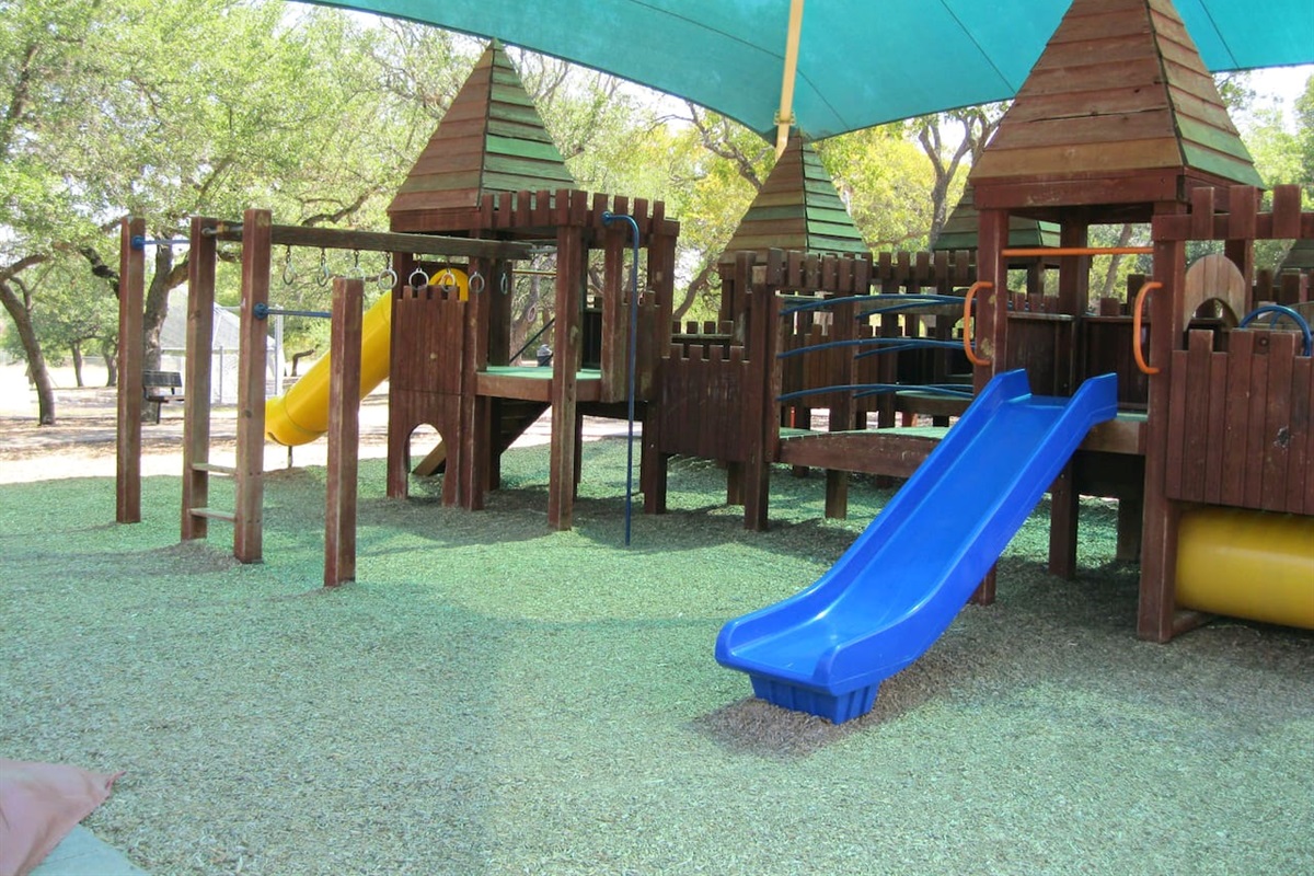 Covered Playscape in Neighborhood Park Is Five Blocks From the House
