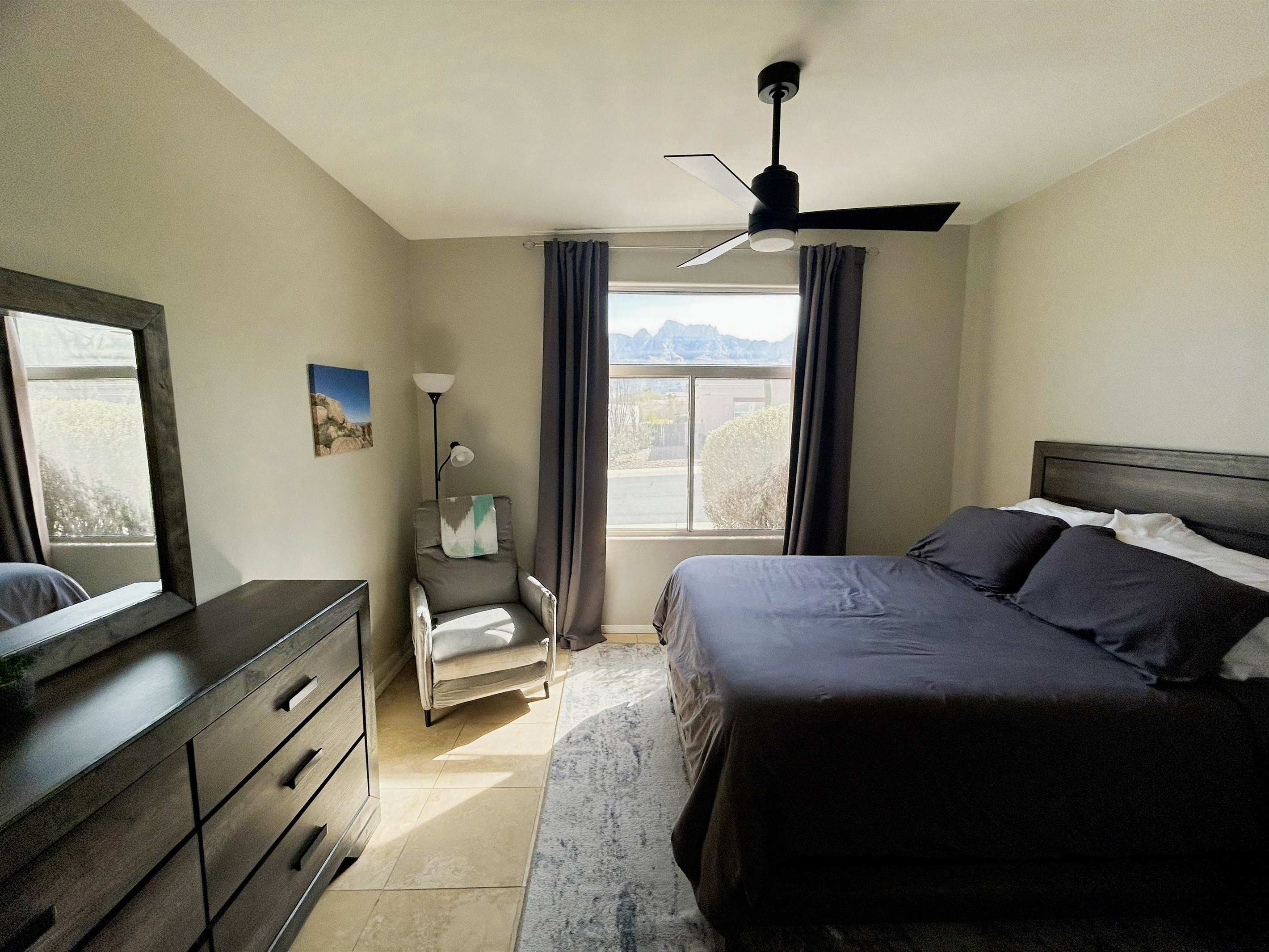 Queen bed, recliner, dresser and amazing mountain views.