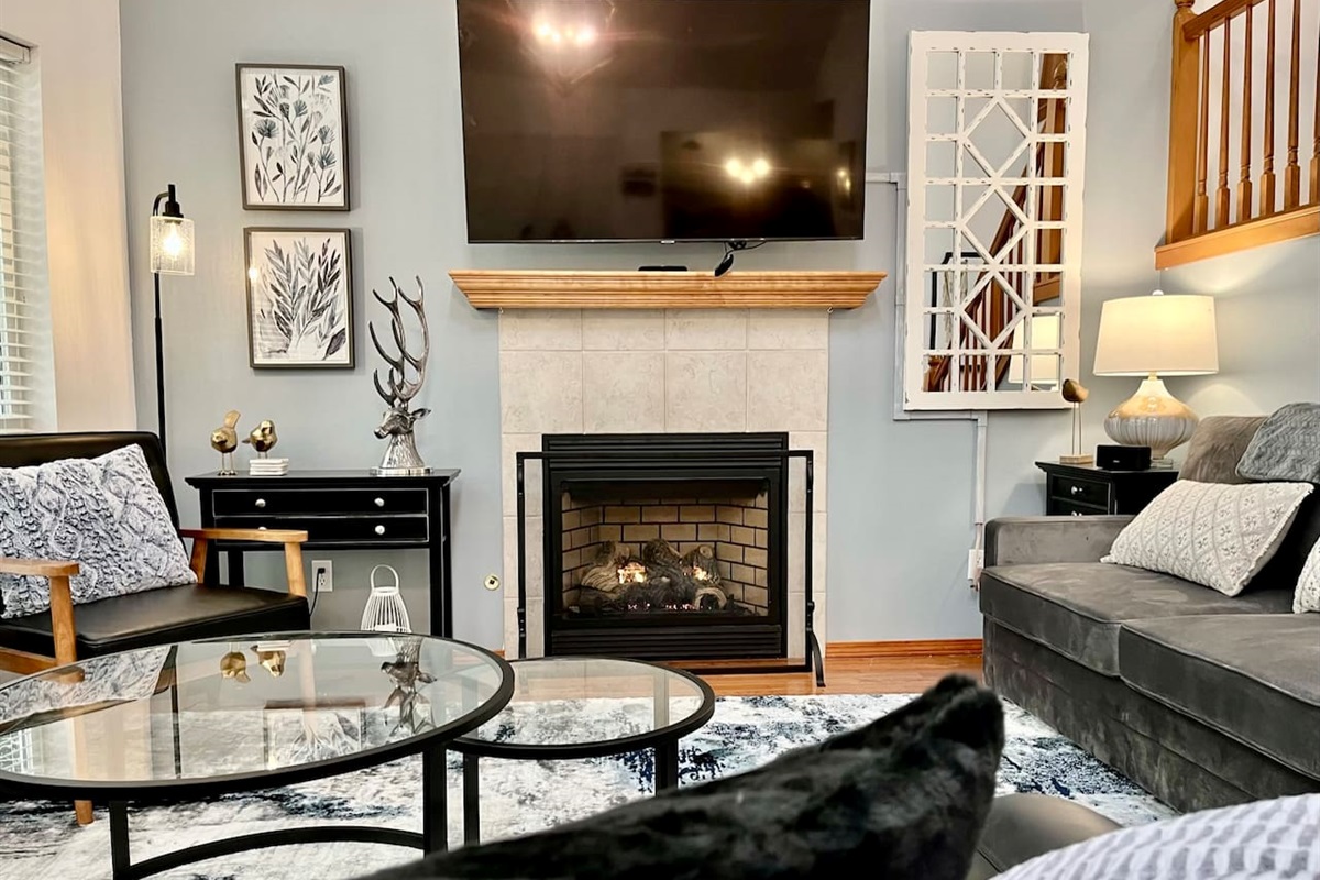 Warm up by the fire and enjoy some coffee or drinks in our cozy living room