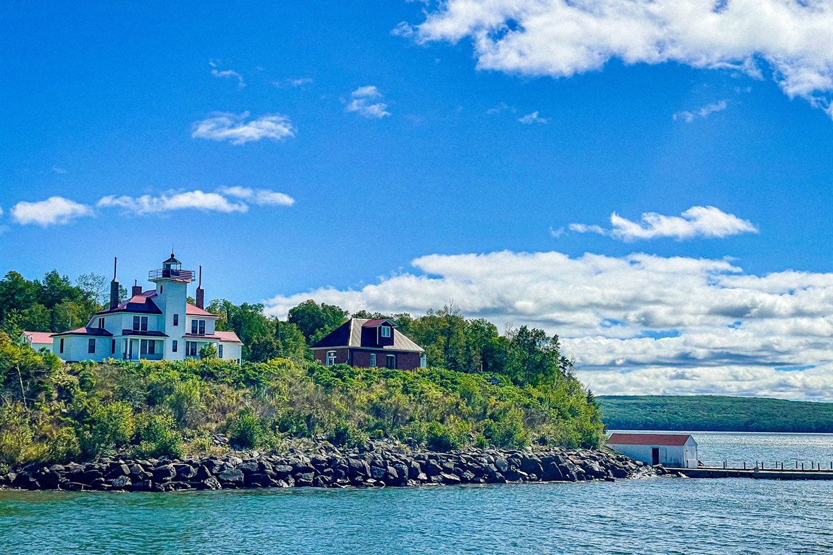 Raspberry Island and historic light house. Accessible by boat charter cruises or Apostle Island Cruises tour. Weather permitting and seasonal 