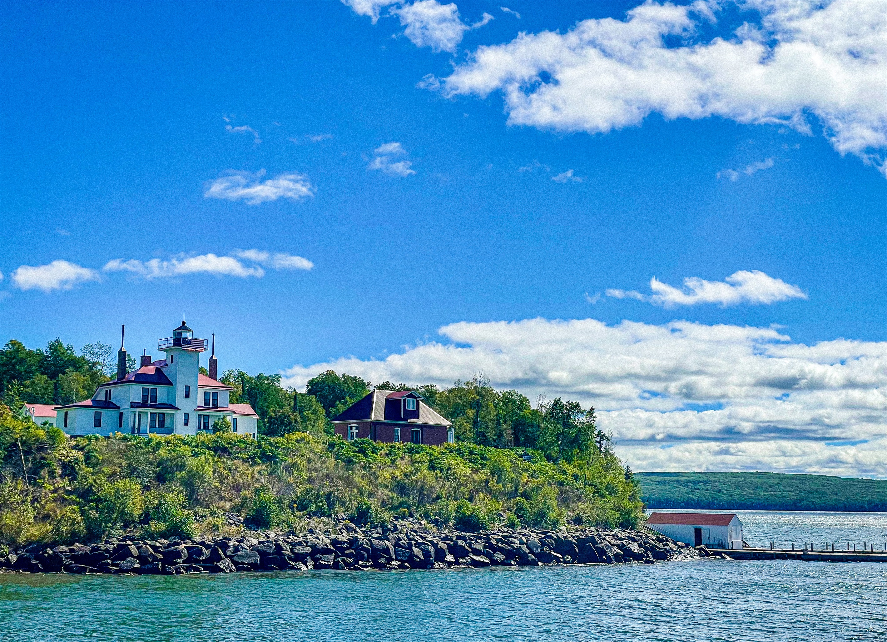 Raspberry Island and historic light house. Accessible by boat charter cruises or Apostle Island Cruises tour. Weather permitting and seasonal 