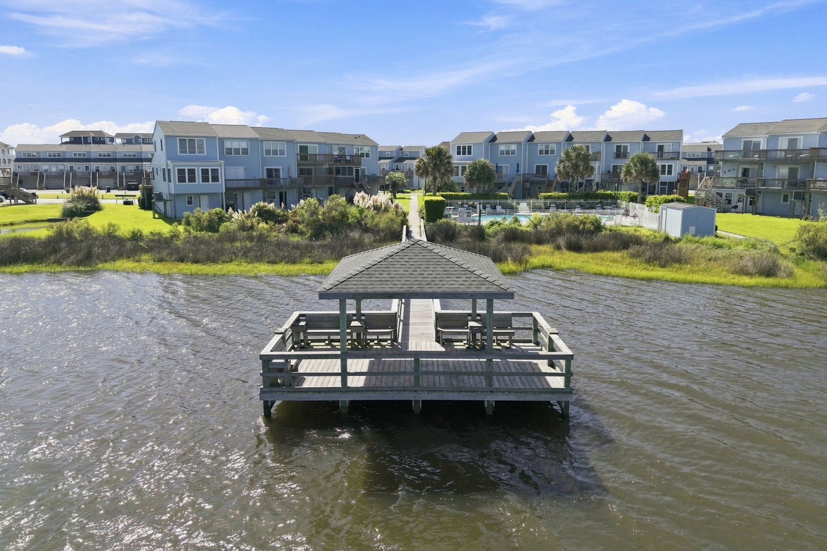 Unwind and take in breathtaking sunset views from the community's private gazebo dock over the water.