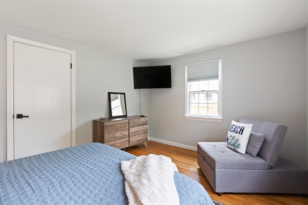 Enjoy sweet dreams and morning light in our inviting queen bedroom.