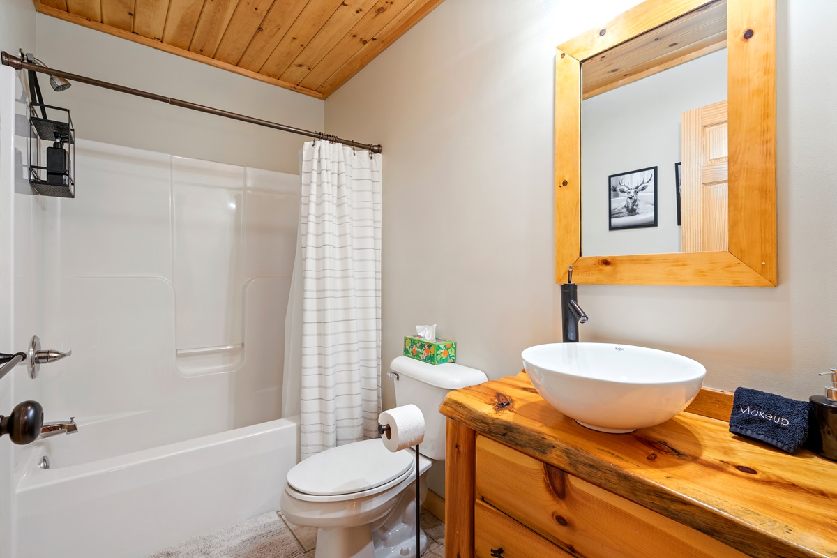 Simple and functional, this bathroom with a tub adds extra comfort and flexibility for your group.