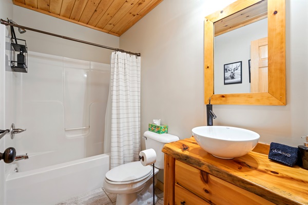 Simple and functional, this bathroom with a tub adds extra comfort and flexibility for your group.