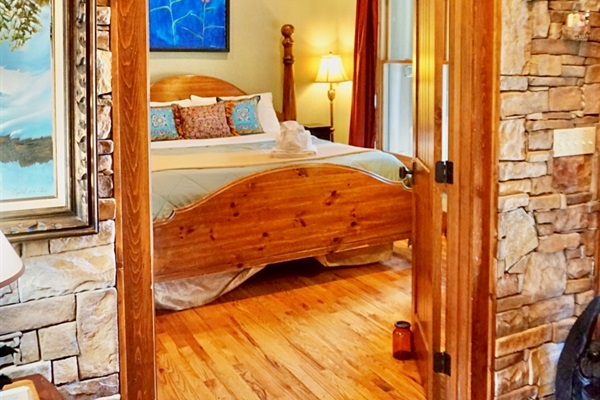 Rustic dreams await. Sink into comfort in this cozy bedroom.