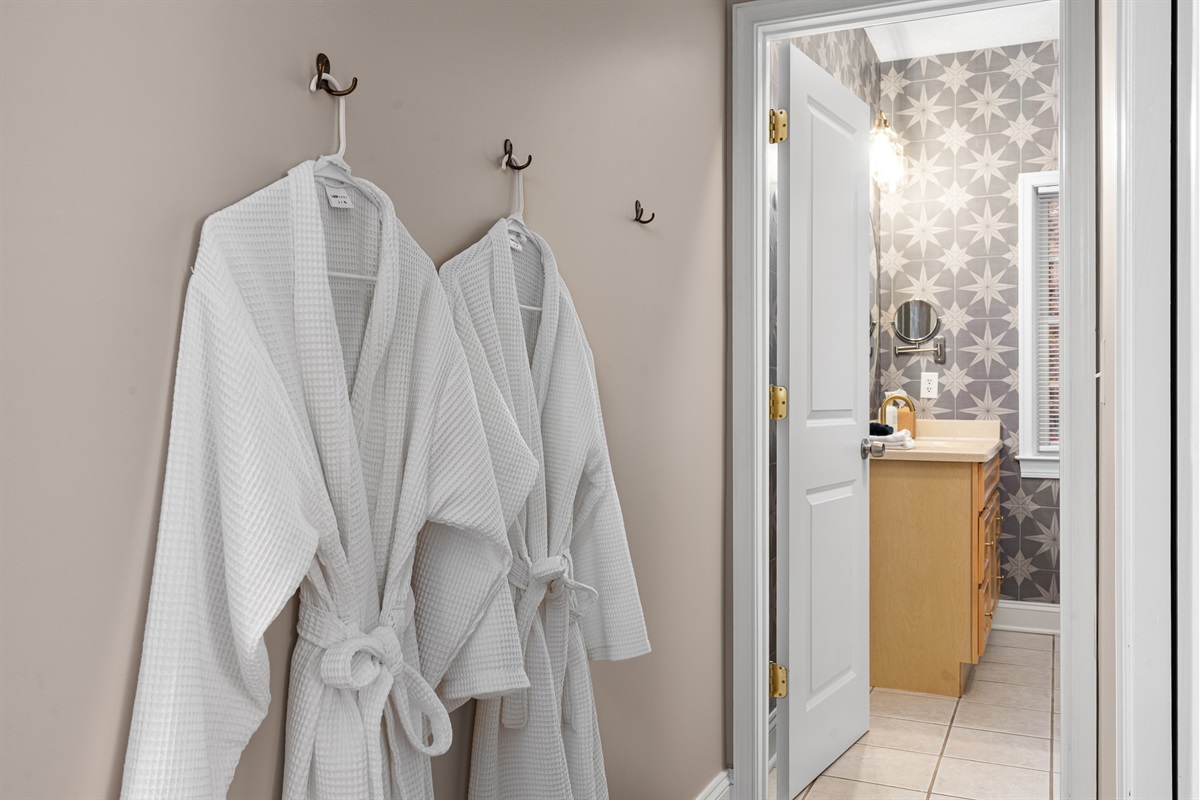 Relaxation mode activated — spa-style robes and a hot steamy sauna or hot tub just steps away