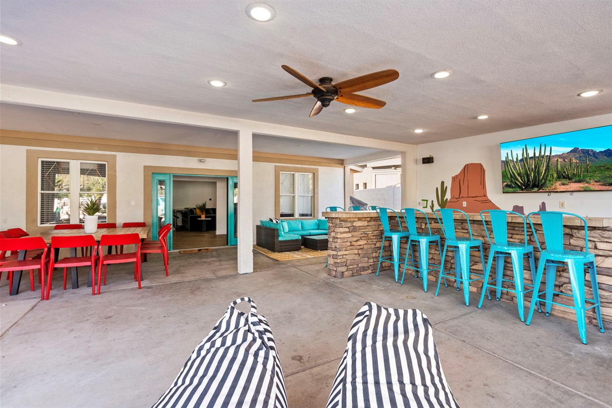 Ber seats 7 & Dining table seats 10!  Comfy outdoor couch behind the bar for more seating and an outdoor half bath