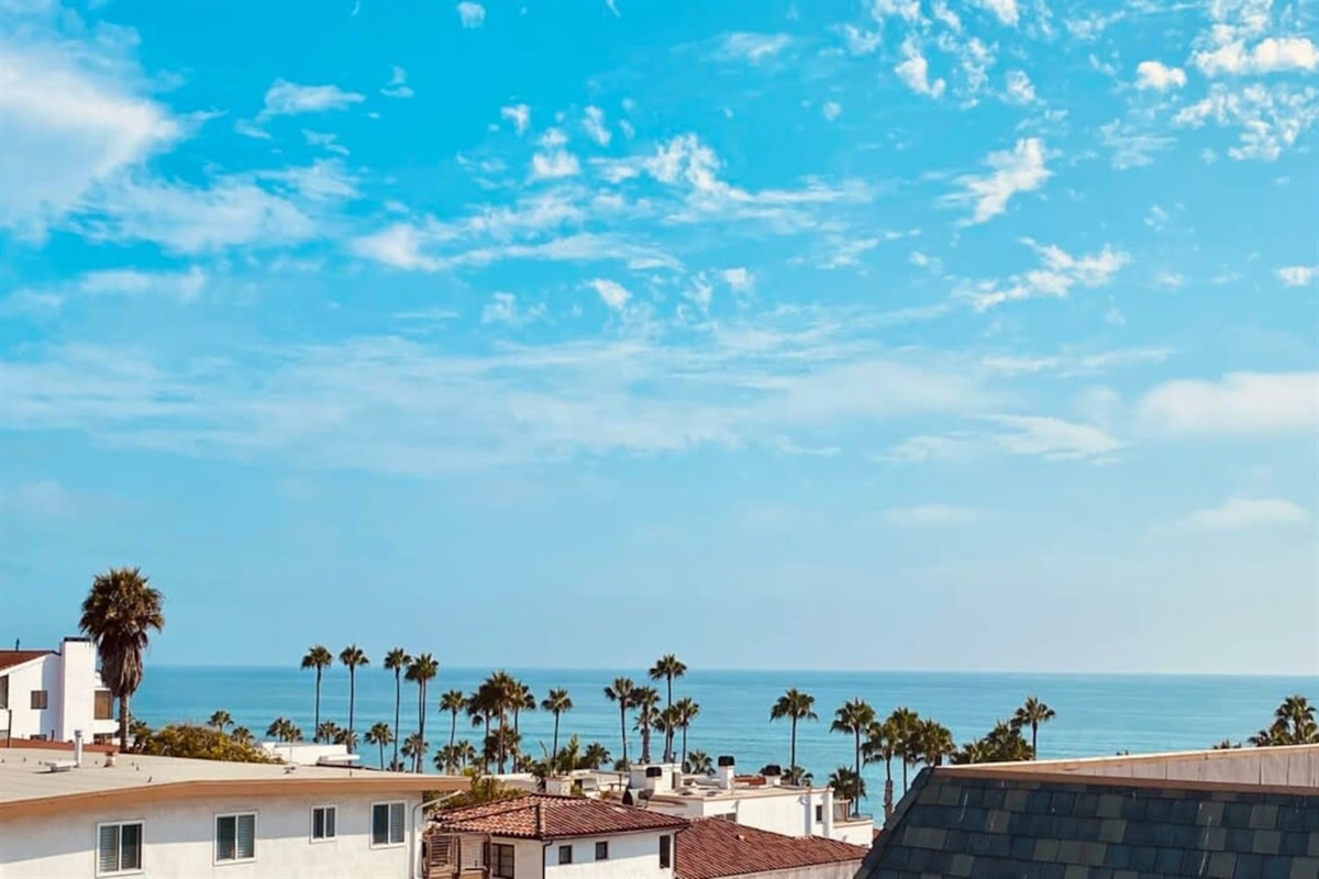 The view to the south is equally beautiful full of palm trees and a vast horizon.  Gentle ocean breezes and the sounds of waves will remind you just how close you are to the pier and the beach.