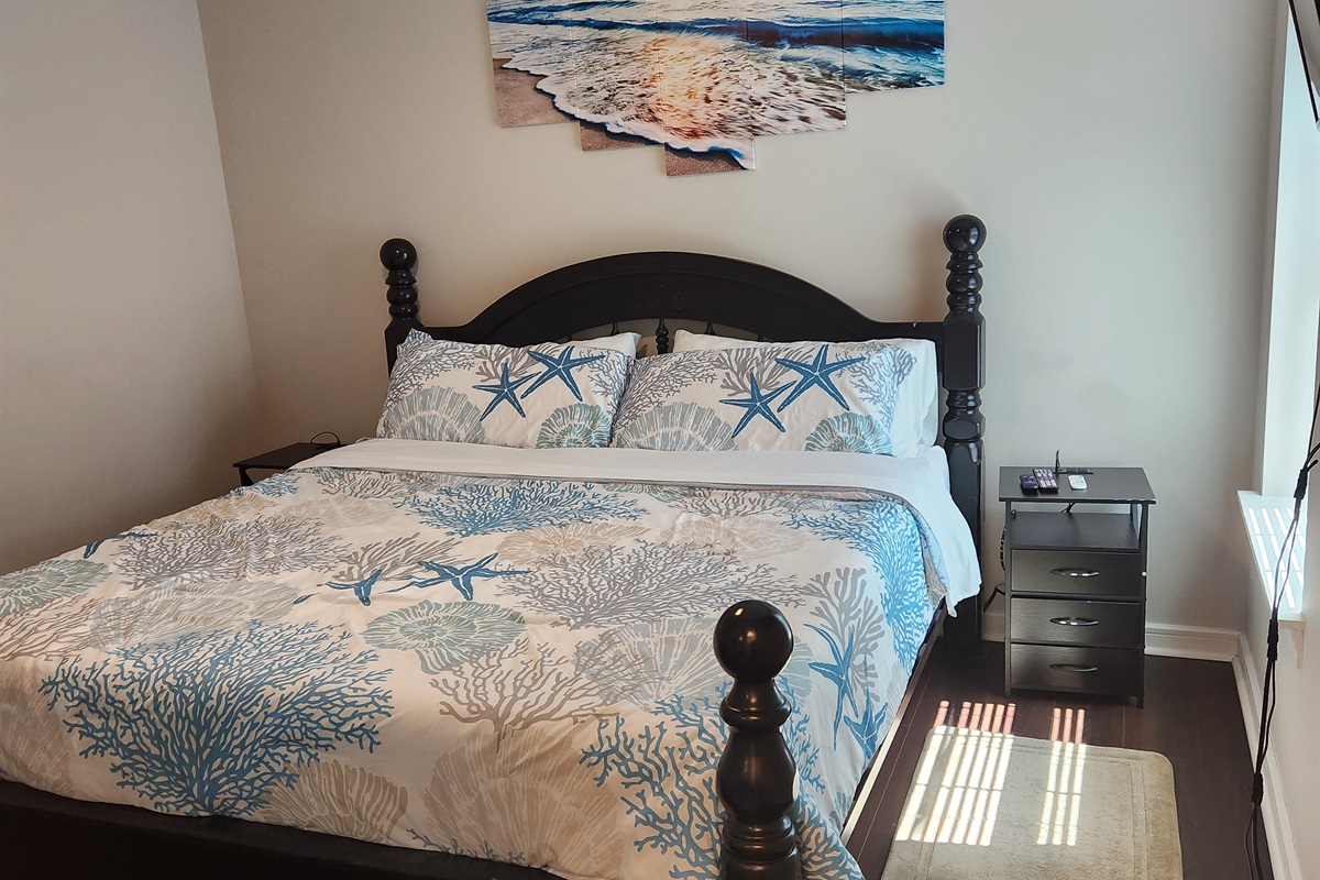 Drift off to sleep in this coastal-inspired retreat, where comfort meets charm.