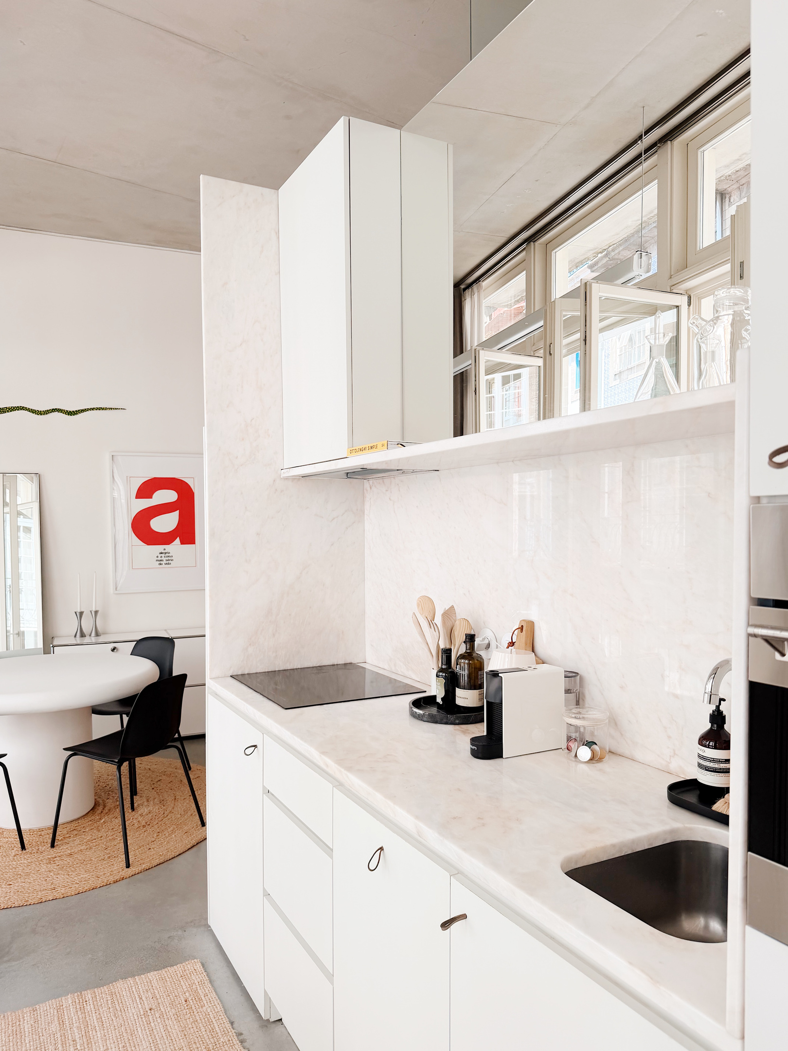 Kitchen with induction cooktop.