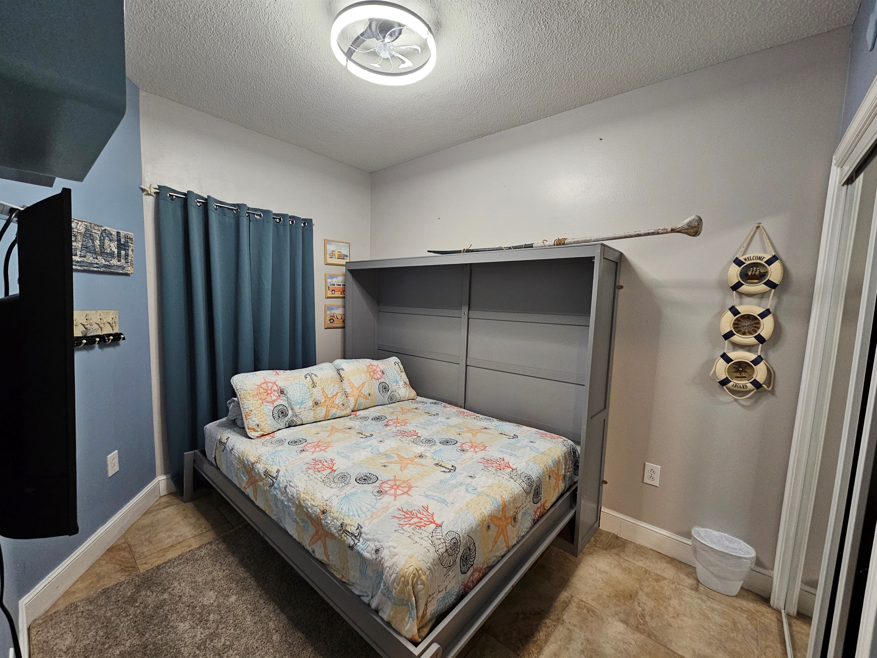 3rd bedroom with queen bed and 40" Smart TV. 