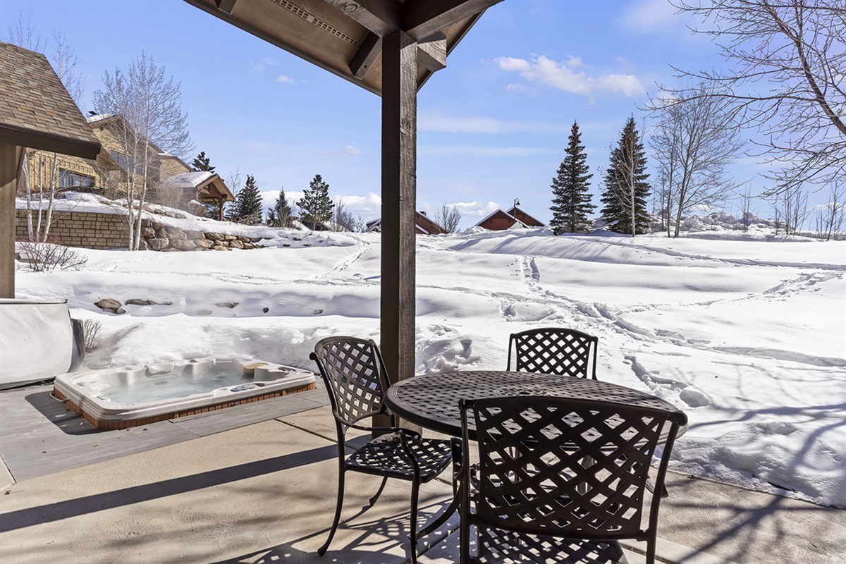 Outdoor patio seating area—perfect for morning coffee or taking in the crisp mountain air.