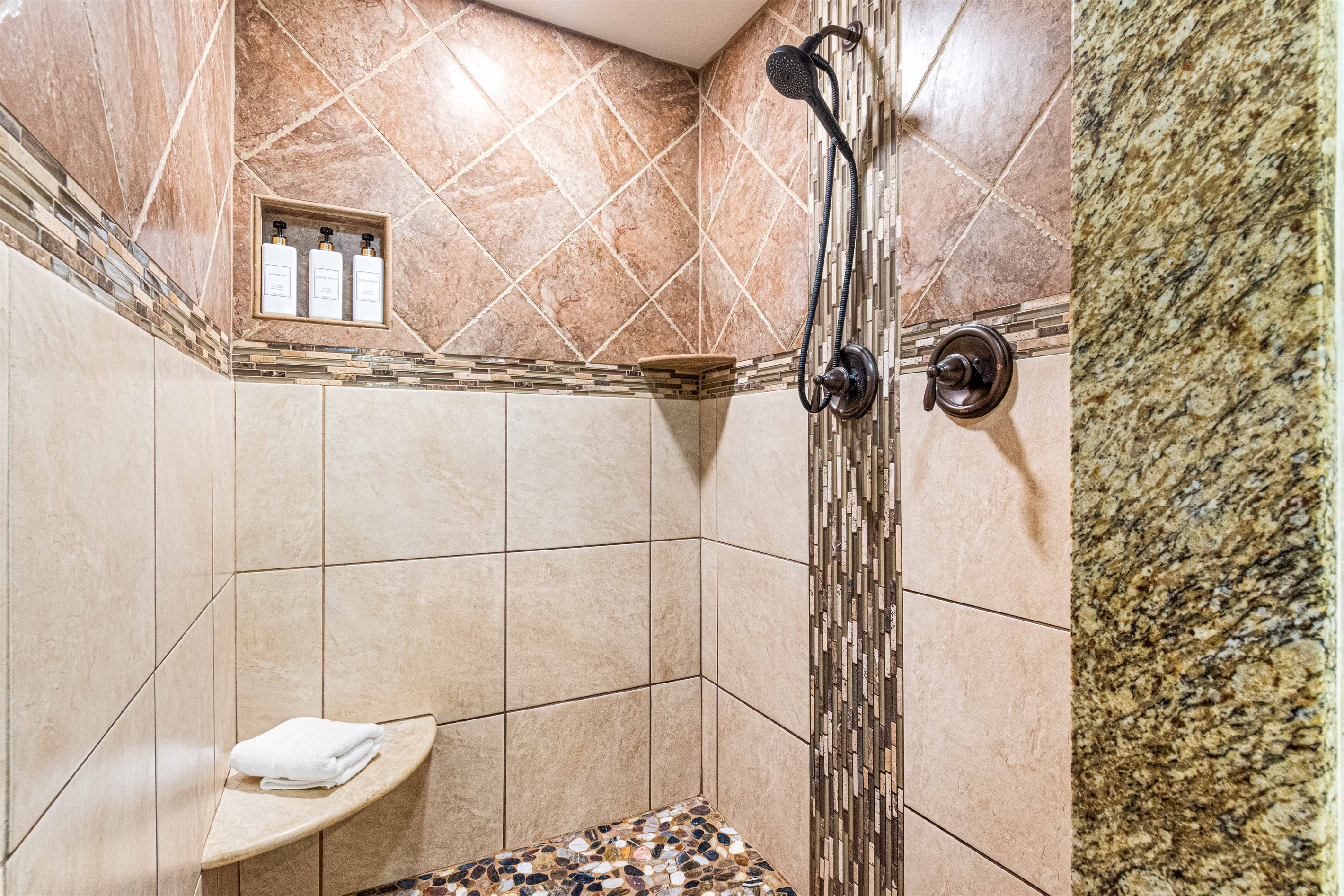 Primary bathroom on main level with walk in shower