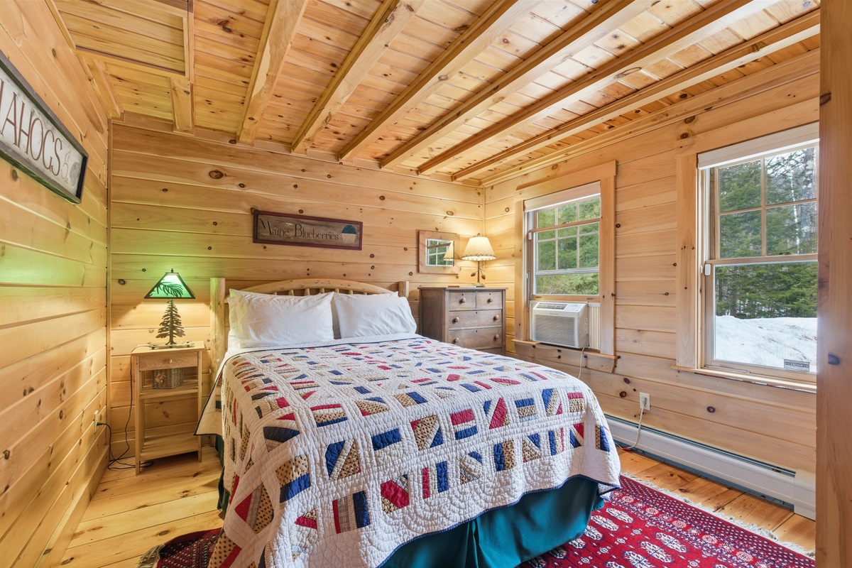 Comfortable queen bedroom on the main floor for easy access and restful nights.