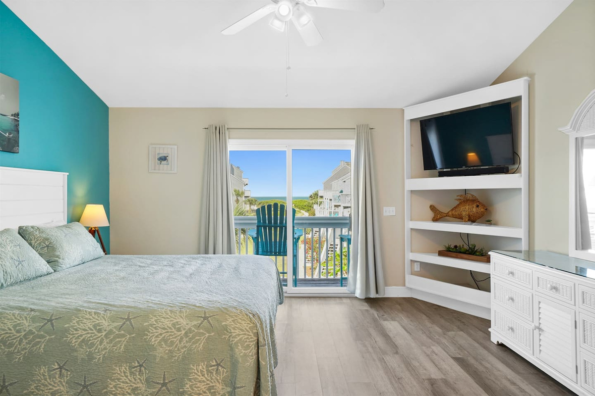 Step from the king bed to your private deck and catch the night sky before turning in.