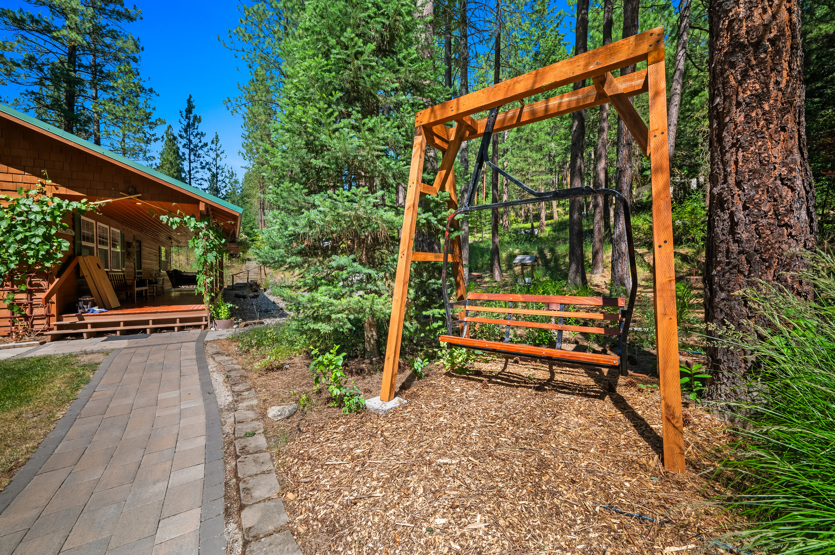 Enjoy swinging on a ski lift chair while watching your kids or dogs play in the grass.